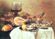 Pieter Claesz, A ham a herring oysters a lemon bread onions grapes